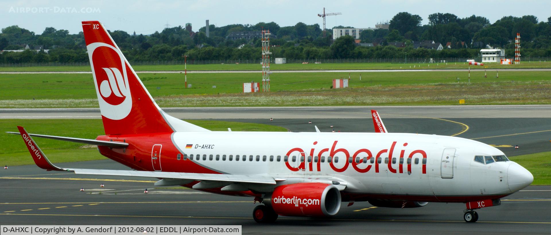 D-AHXC, 2007 Boeing 737-7K5 C/N 34693, TUIfly (Air Berlin cs.), is taxiing for departure at Düsseldorf Int´l (EDDL)