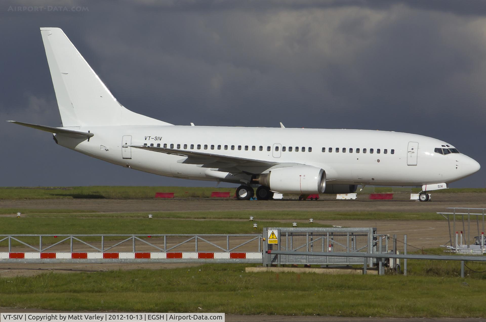 VT-SIV, 1999 Boeing 737-7K9 C/N 28091, Sat in the sun.