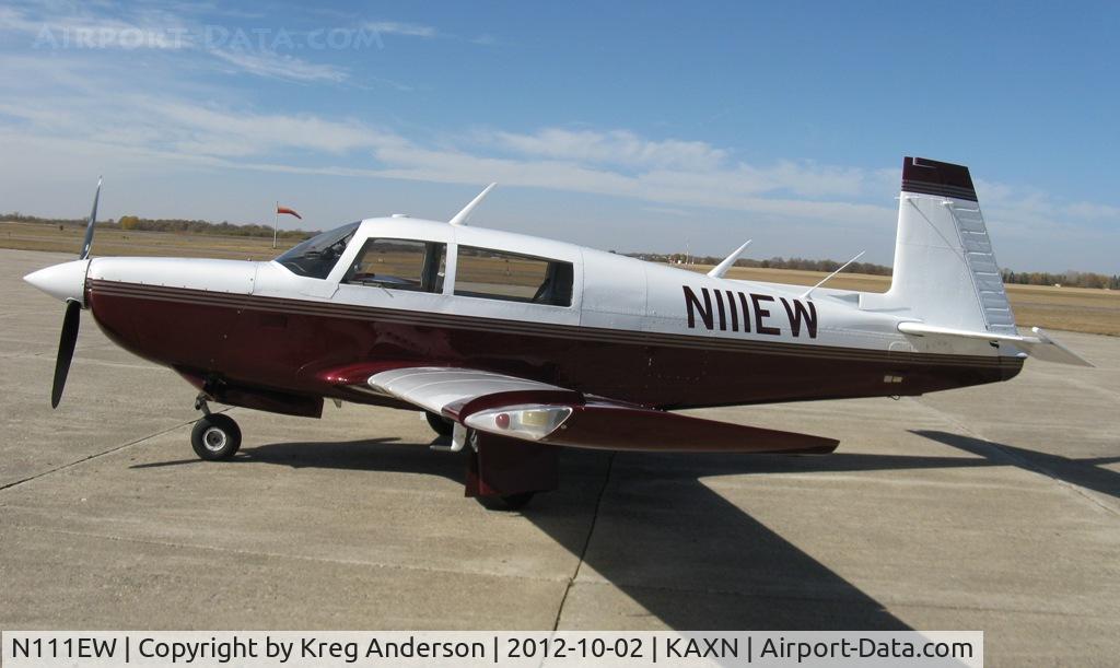 N111EW, 1980 Mooney M20K C/N 25-0412, Mooney M20K on the ramp.