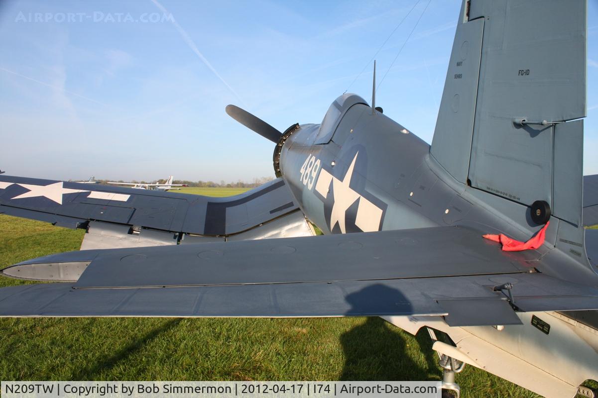 N209TW, Goodyear FG-1D Corsair C/N 3750, Dawn in the grass at Urbana, Ohio.  B-25 Gathering and Doolittle Reunion.