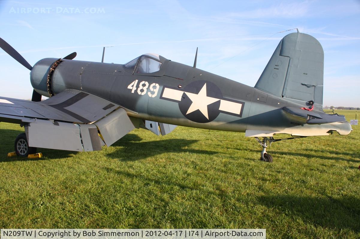 N209TW, Goodyear FG-1D Corsair C/N 3750, Dawn in the grass at Urbana, Ohio.  B-25 Gathering and Doolittle Reunion.