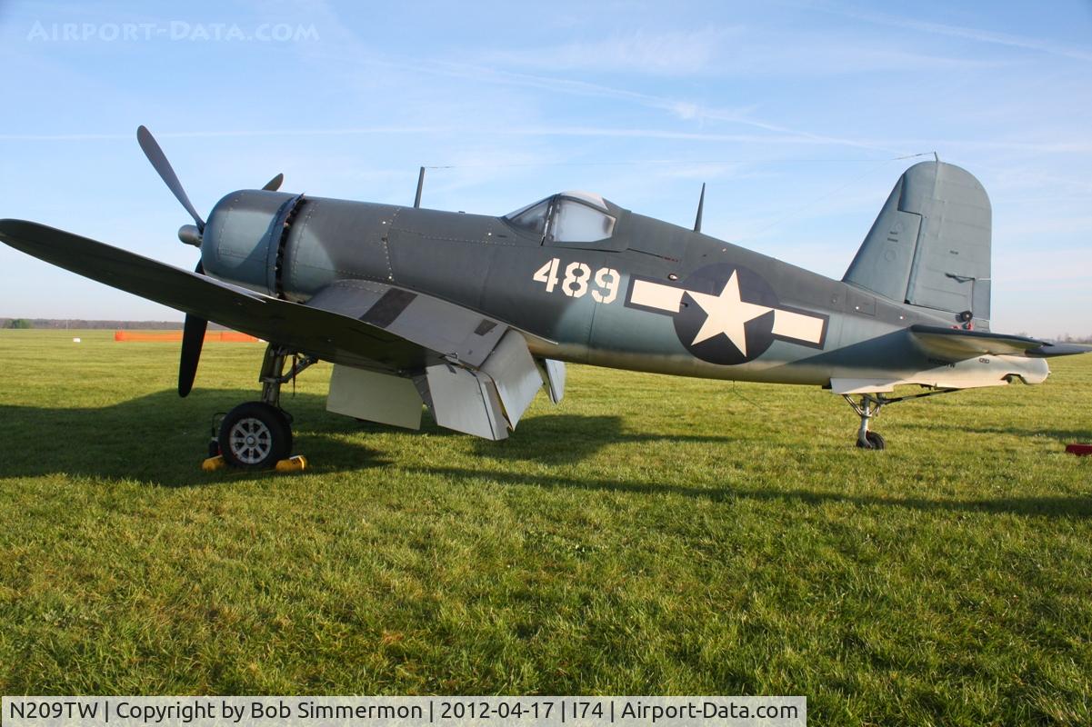 N209TW, Goodyear FG-1D Corsair C/N 3750, Dawn in the grass at Urbana, Ohio.  B-25 Gathering and Doolittle Reunion.