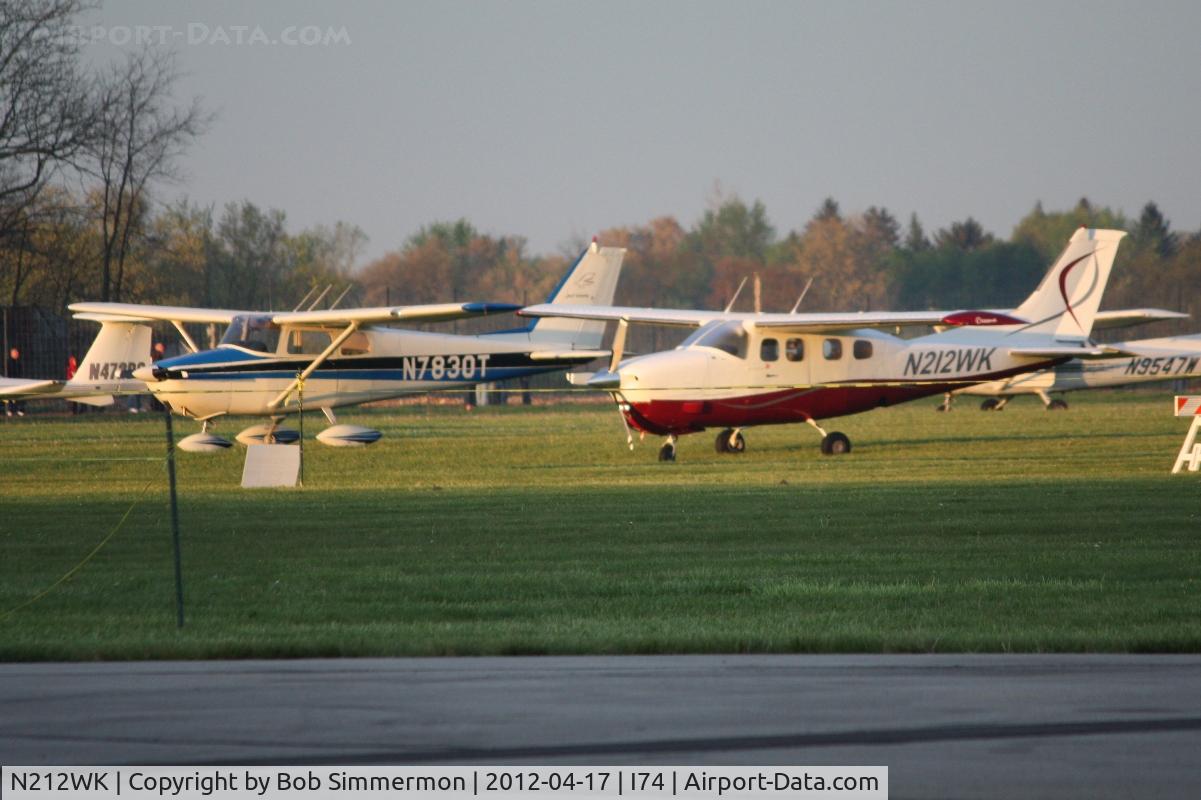 N212WK, 1979 Cessna P210N Pressurised Centurion C/N P21000372, Dawn in the grass at Urbana, Ohio.  B-25 Gathering and Doolittle Reunion.