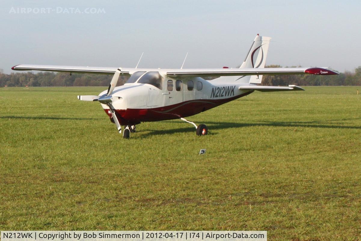 N212WK, 1979 Cessna P210N Pressurised Centurion C/N P21000372, Dawn in the grass at Urbana, Ohio.  B-25 Gathering and Doolittle Reunion.