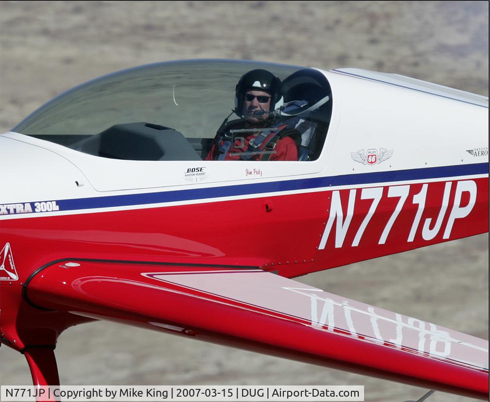 N771JP, 1997 Extra EA-300/L C/N 054, Shot air-to-air during border to border air show.  Mike King took the picture. Glenn Spencer flew the TU-206/