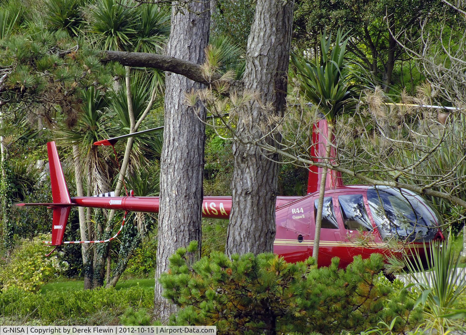 G-NISA, 2010 Robinson R44 Clipper II C/N 12881, Seen at Caswell Bay, Swansea, ex G-HTMT, must be a tricky landing.