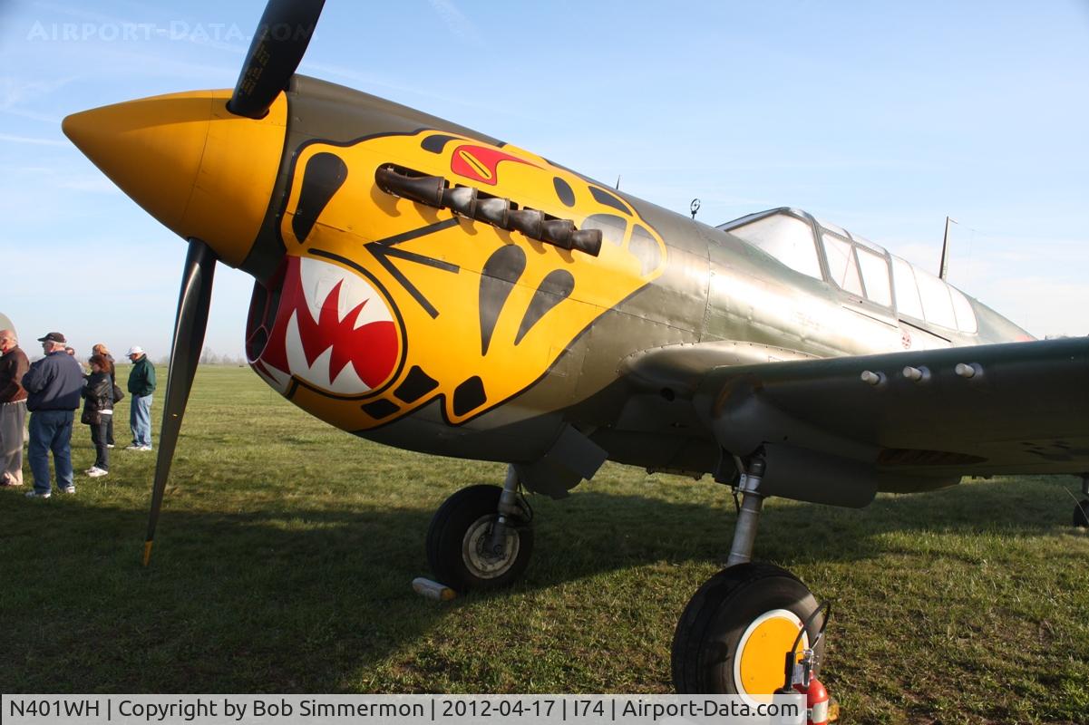 N401WH, 1942 Curtiss P-40K Warhawk C/N 42-10256, Dawn in the grass at Urbana, Ohio.