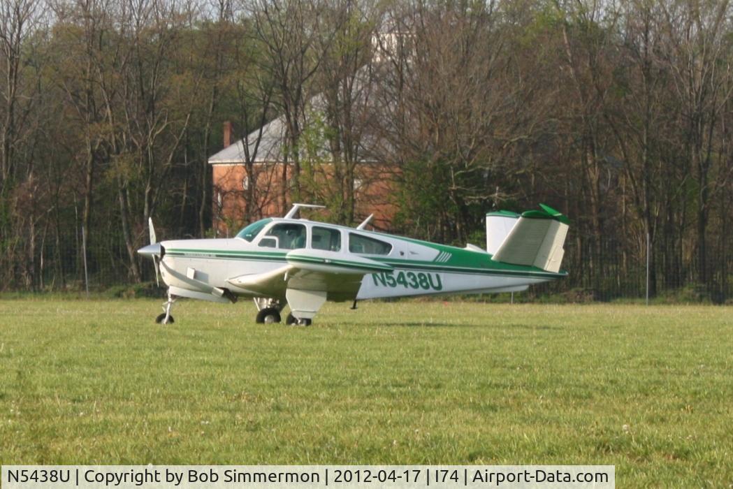 N5438U, 1967 Beech V35 Bonanza C/N D-8509, In the grass at Urbana, Ohio during the B-25 Gathering and Doolittle Reunion.