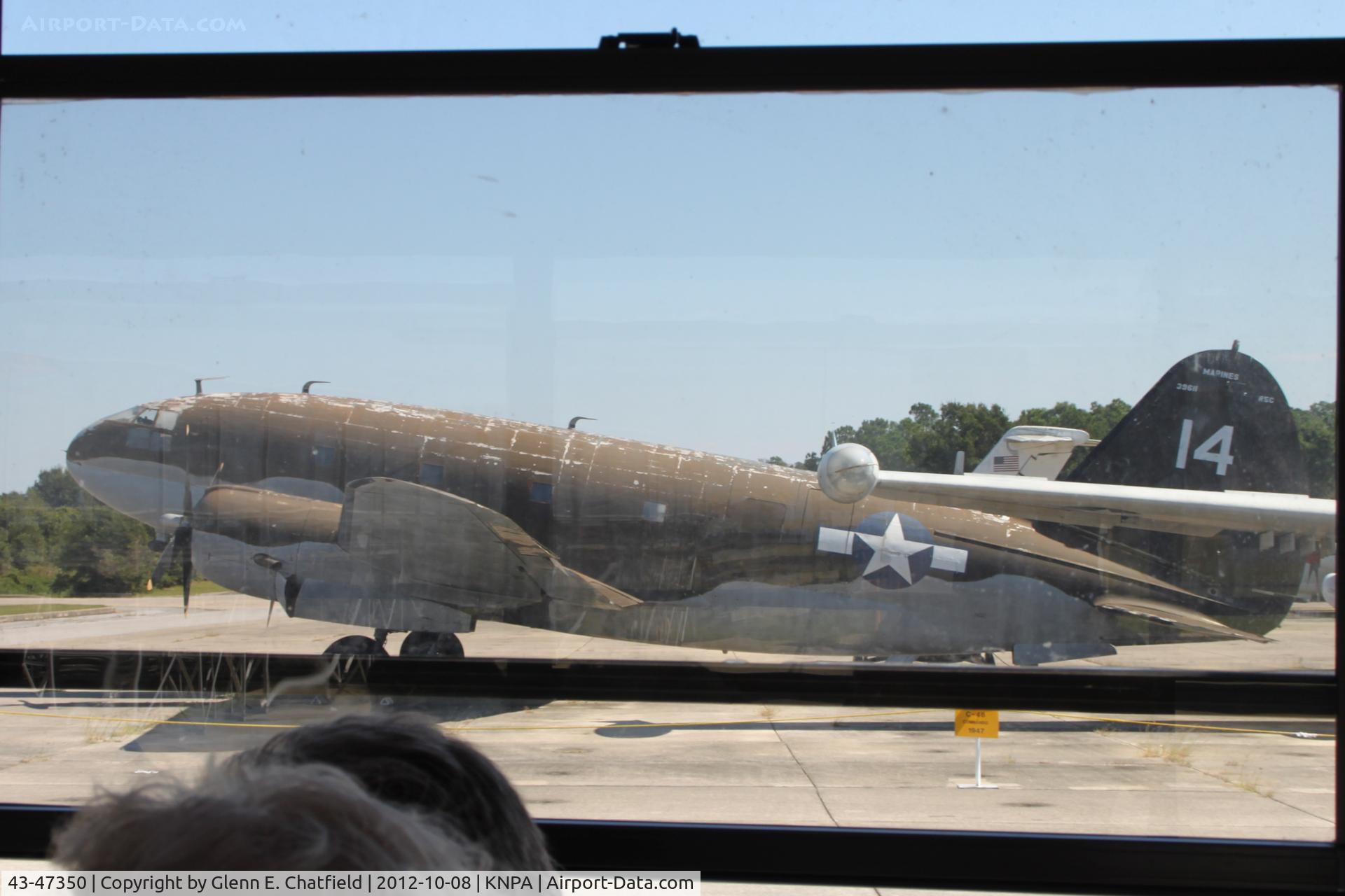 43-47350, 1955 Curtiss C-46A Commando C/N 421/398CK, At the Naval Aviation Museum.  Looking out the opposite side of the bus - the only way I could see it.