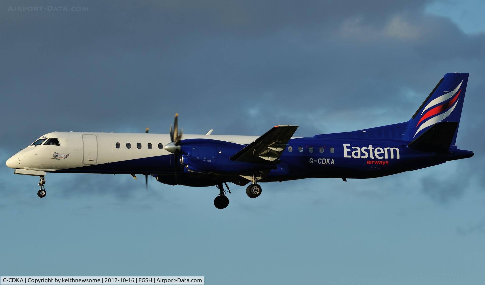 G-CDKA, 1993 Saab 2000 C/N 2000-006, Early evening landing.