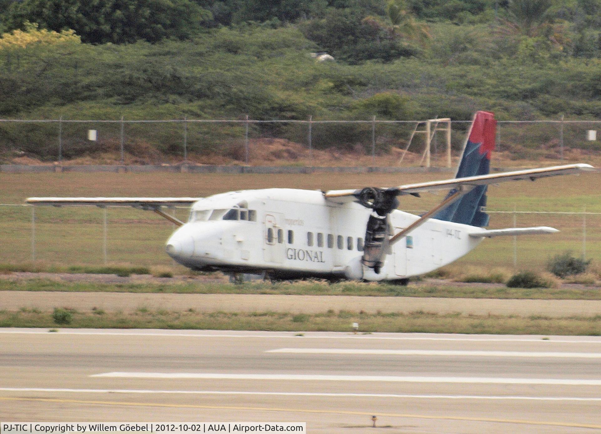 PJ-TIC, Short 360 C/N Not found PJ-TIC, Parking outside the runway of Reina Beatrix Airport Aruba and the aircraft are used for his parts.