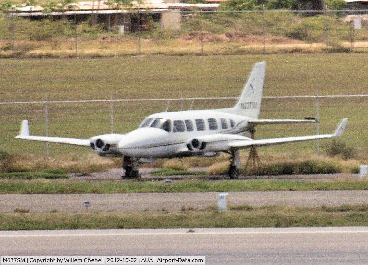 N637SM, 1975 Piper PA-31-350 Chieftain C/N 31-7552001, Parking outside the runway of Reina Beatrix Airport w/o engines.