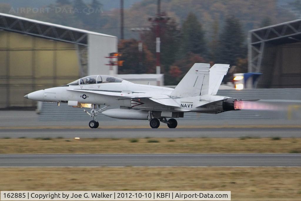 162885, McDonnell Douglas F/A-18B Hornet C/N 434/B076, All white F/A-18 blasts off from BFI on a typical fall evening. Aircraft was formerly with the US Navy's Fighter Pilot School.
