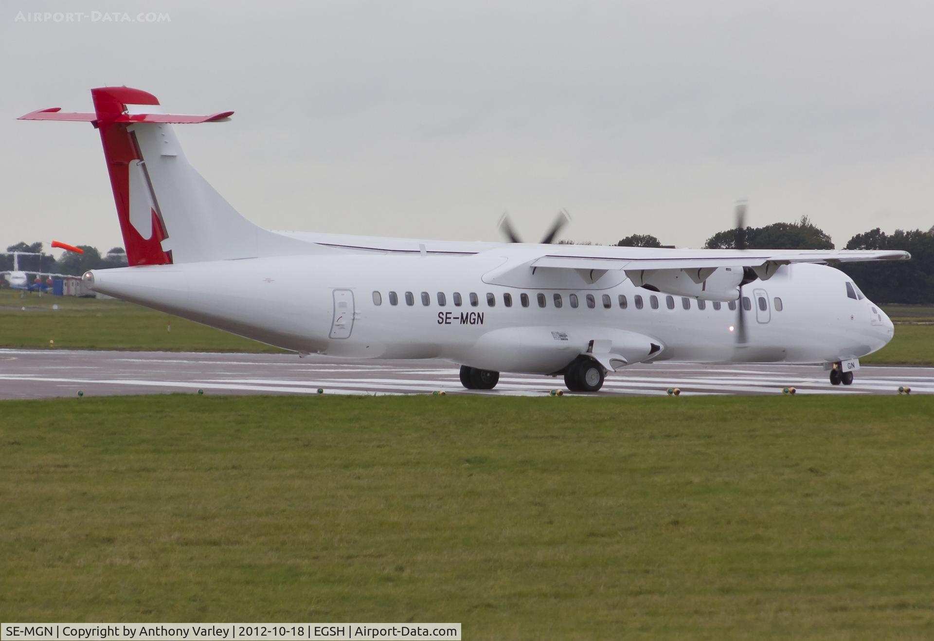 SE-MGN, 1994 ATR 72-202 C/N 437, Departing after spray by Air Livery.