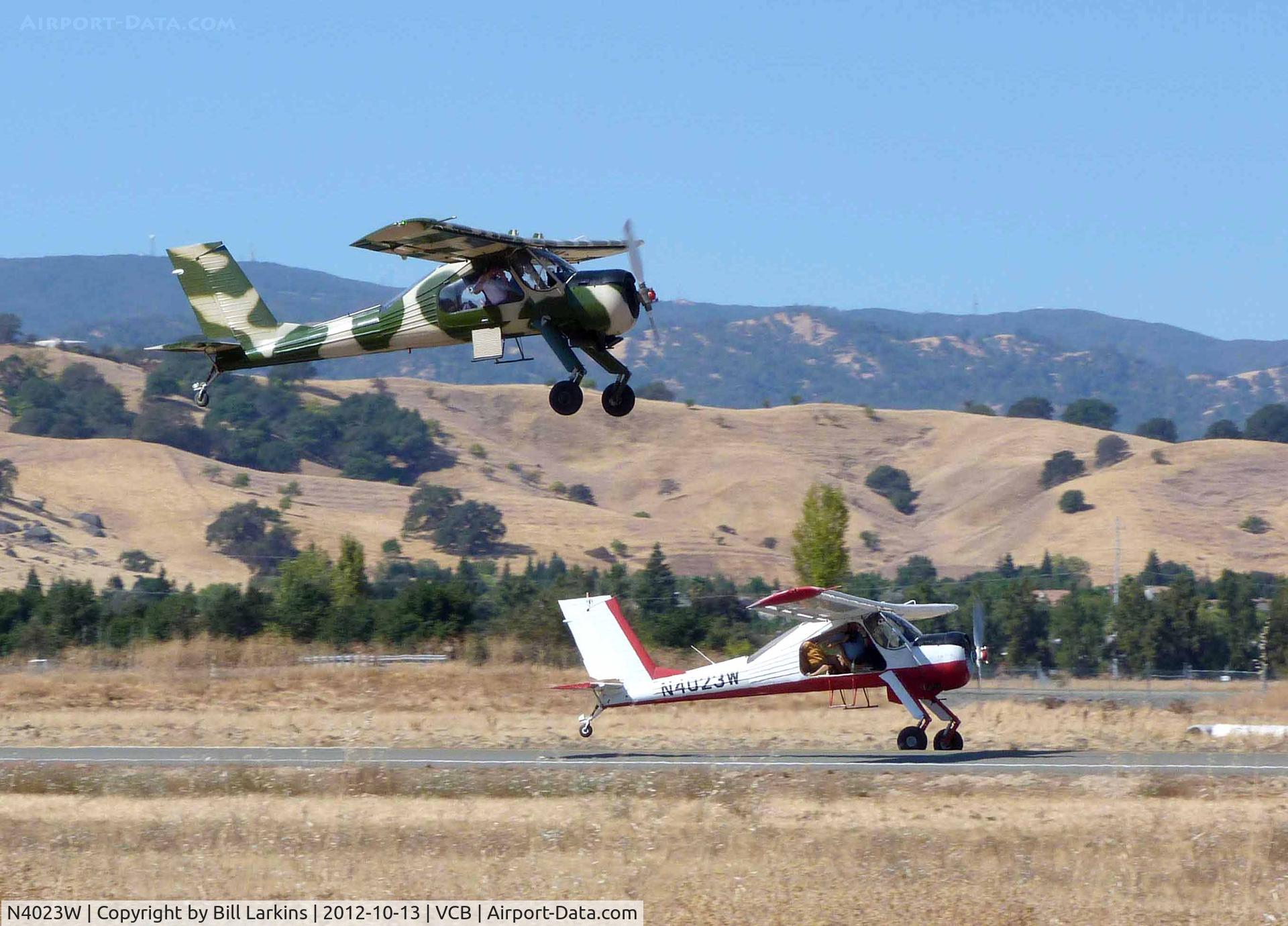 N4023W, 1991 PZL-Okecie PZL-104 Wilga 80 C/N CF21910930, Formation takeoff.