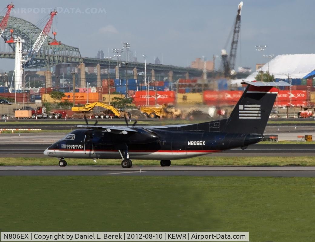 N806EX, 1991 Boeing DHC-8-102 C/N 263, Still wearing its old US Airways scheme, this Dash-8 taxies for takeoff at Newark.