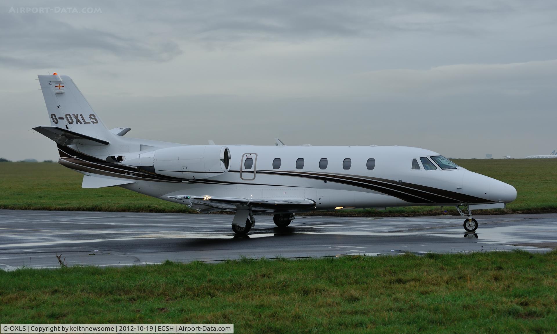 G-OXLS, 2007 Cessna 560XL Citation Excel C/N 560-5675, Leaving in the rain !