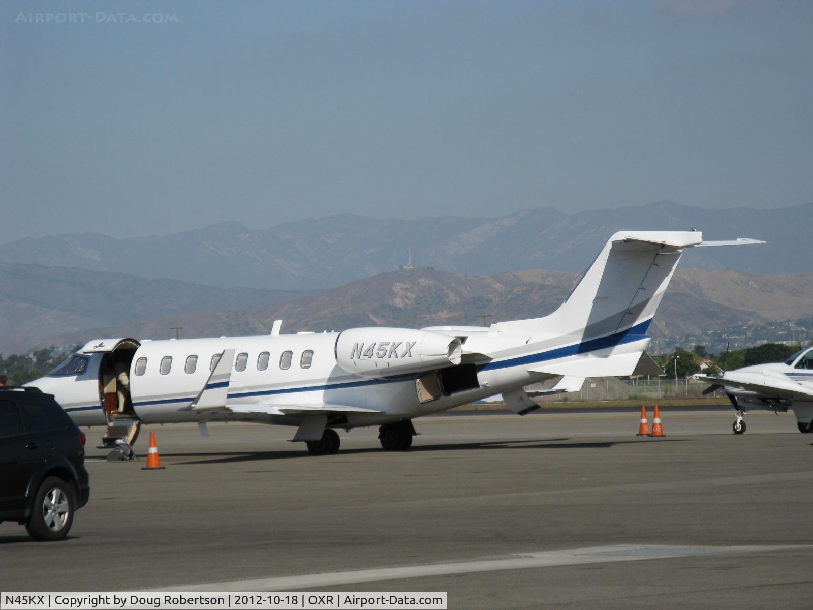 N45KX, Learjet Inc 45 C/N 233, 2004 Learjet 45 Business Jet, two Honeywell TFE731-20 Turbofans flat rated at 3,500 lb st each. Thrust reversers, digital electronic engine controls. On Oxnard Aircraft and Jet Center ramp.