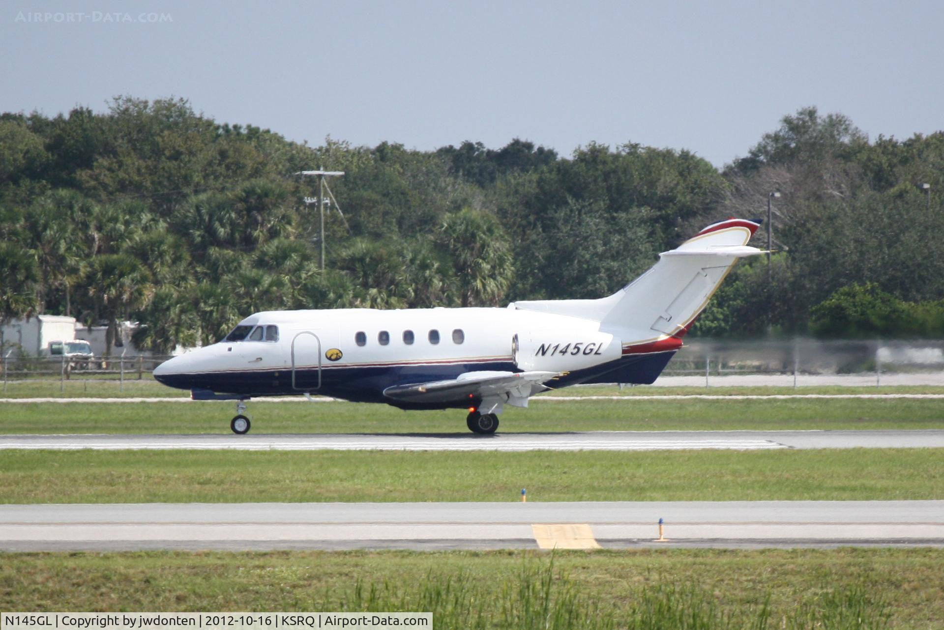 N145GL, Hawker Siddeley BH.125-400A C/N NA753, British Aerospace 125 (N145GL) departs Sarasota-Bradenton International Airport