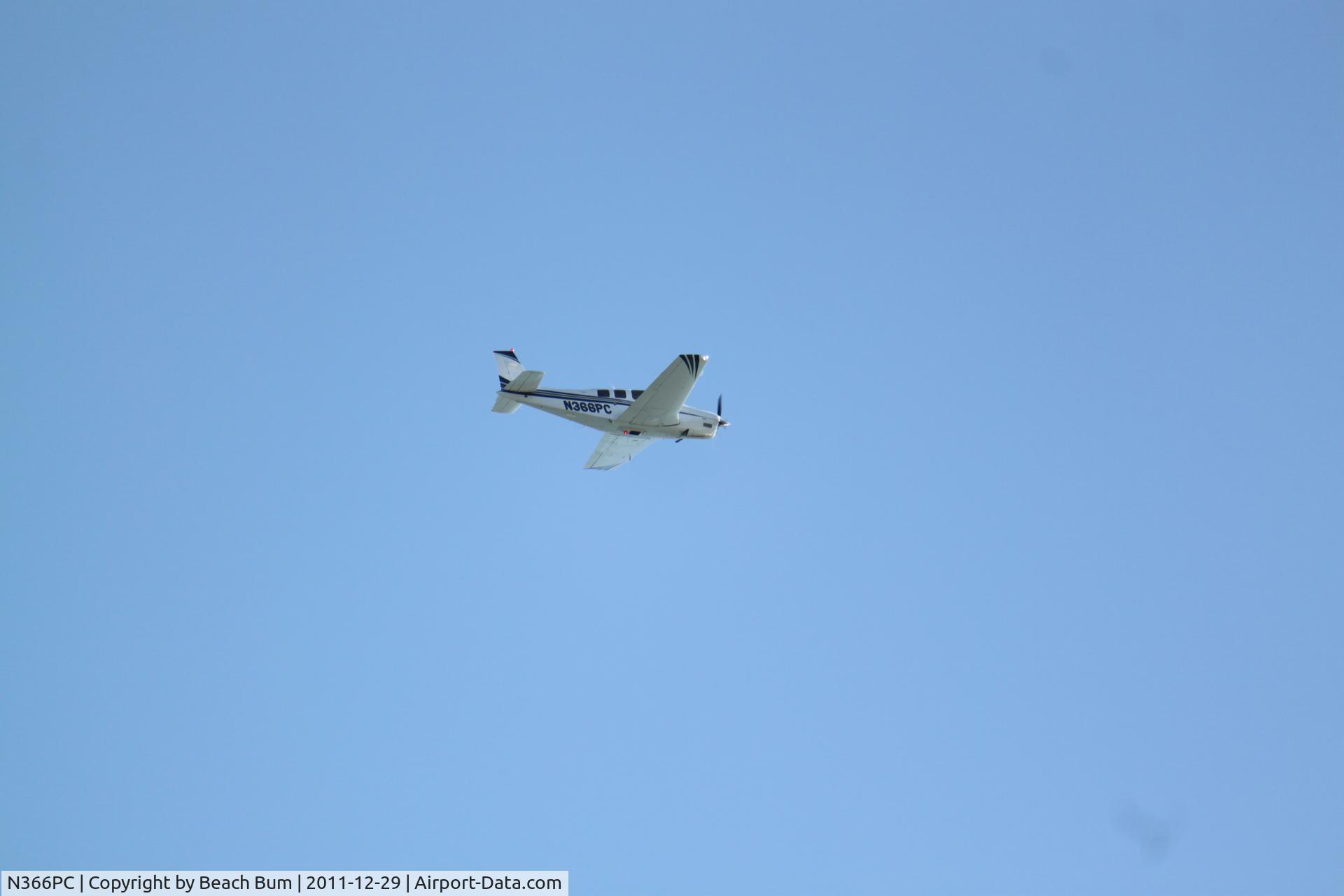 N366PC, Raytheon Aircraft Company G36 C/N E-3685, Flying over Anastasia Island 12/29/2011
