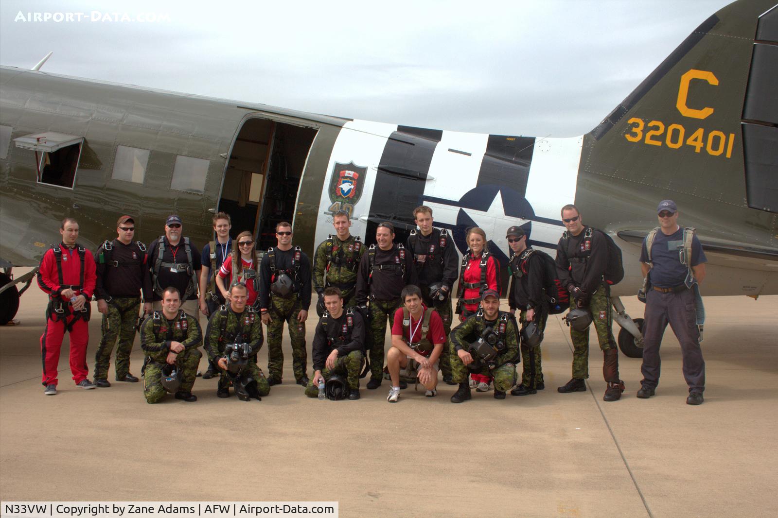 N33VW, 1943 Douglas DC3C-S1C3G (C-47A) C/N 20401, At the 2012 Alliance Airshow - Fort Worth, TX - Your truly third from left, standing. About to go flying with the Canadian Skyhawks Parachute team.