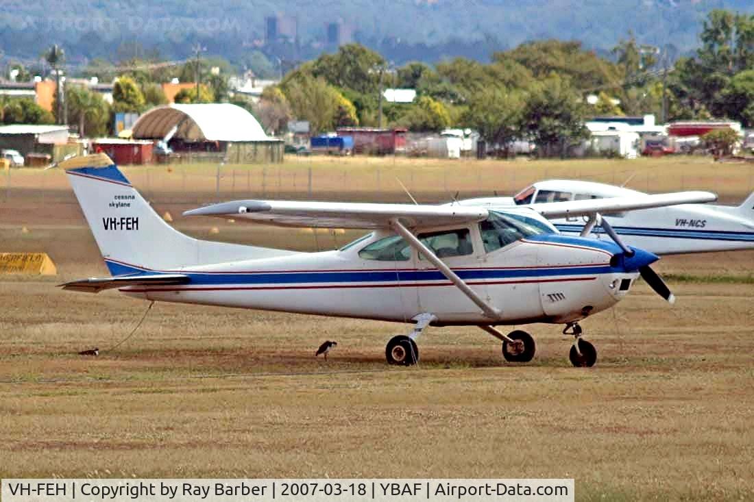 VH-FEH, 1973 Cessna 182P Skylane C/N 18262774, Cessna 182P Skylane [182-62774] Brisbane-Archerfield~VH 18/03/2007.  Even this bird took shelter from the heat under the fuselage. 