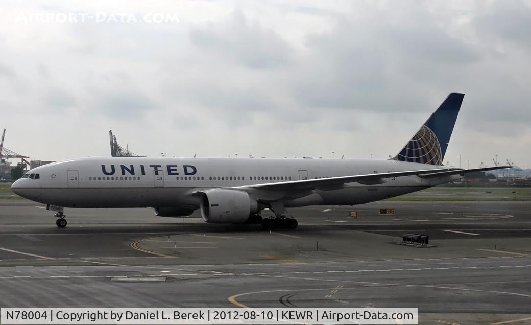 N78004, 1998 Boeing 777-224 C/N 27580, Even on a dark, dreary day, these machines are impressive when seen up close!