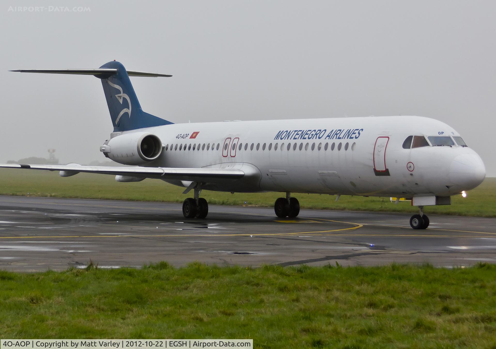 4O-AOP, 1991 Fokker 100 (F-28-0100) C/N 11332, Arriving at a very foggy EGSH for spray by Air Livery.