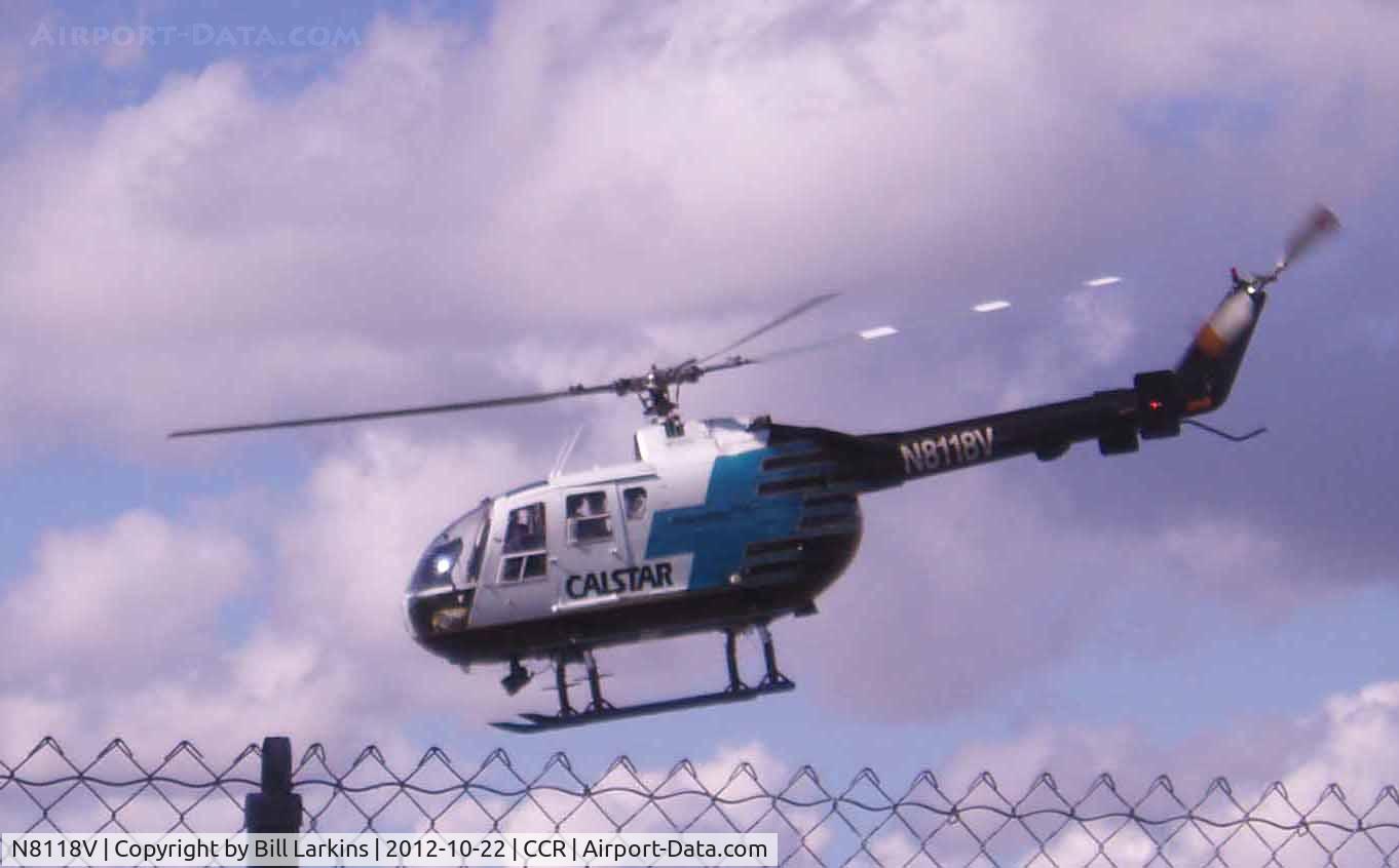 N8118V, MBB Bo-105LS A-3 C/N 2018, Taking off from their base near the Tower.