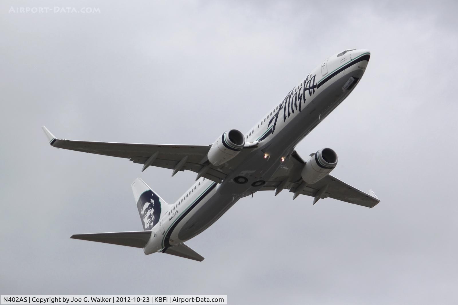 N402AS, 2012 Boeing 737-990/ER C/N 41189, First 737-990ER for Alaska Airlines takes off from KBFI on its delivery flight.