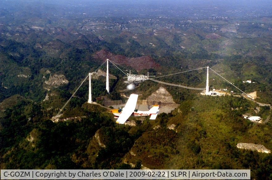 C-GOZM, 1974 Cessna 177B Cardinal C/N 17702223, I flew my bird all the way to Puerto Rico to investigate a crater, only to find that someone had built a radio telescope in it!!

Charles O'Dale
RASC - Ottawa Centre
http://ottawa-rasc.ca/wiki/index.php?title=Odale-Articles
http://ottawa-rasc.ca/wiki