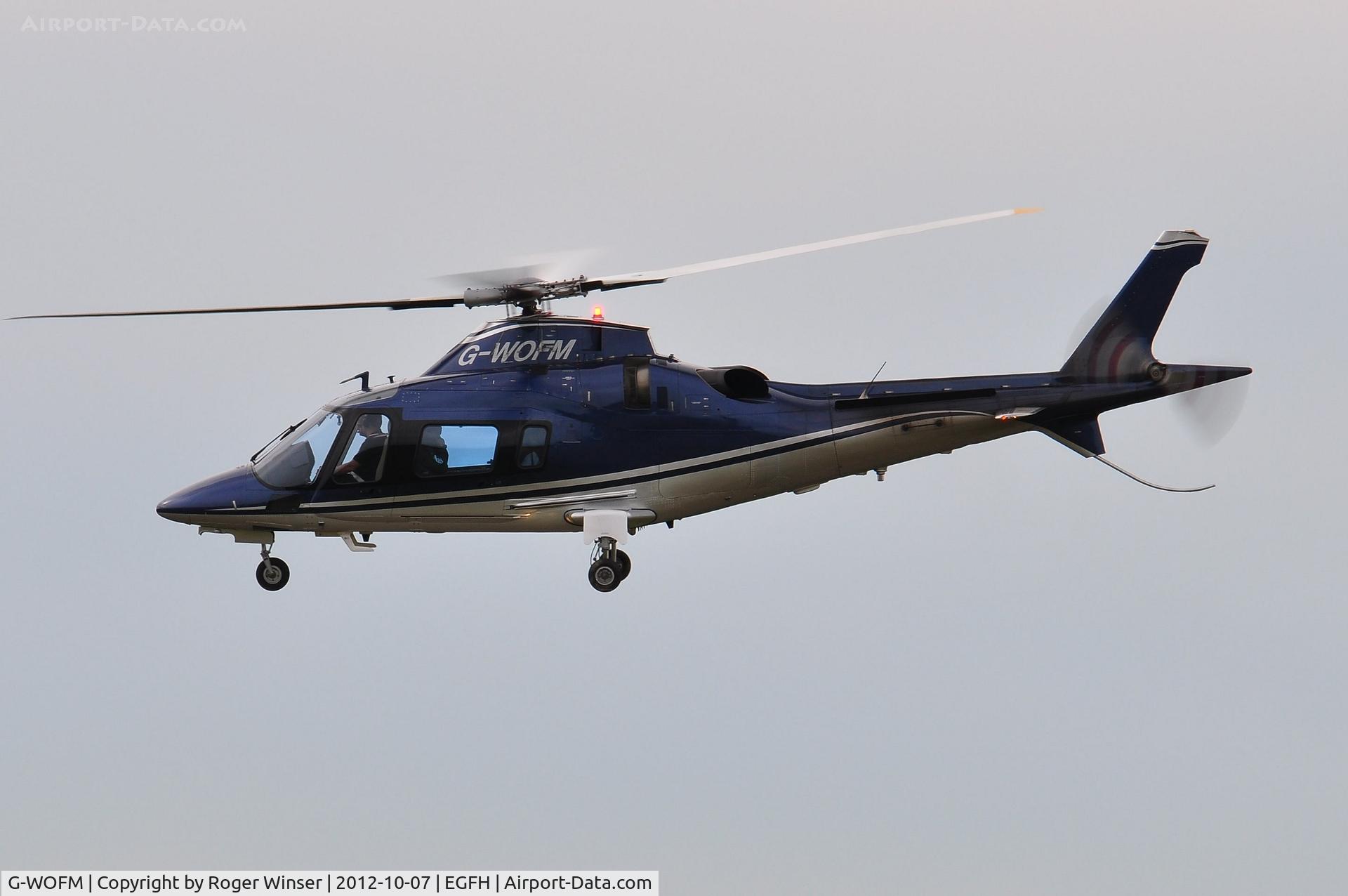 G-WOFM, 2006 Agusta A-109E Power C/N 11678, Visiting helicopter arriving at Swansea Airport.