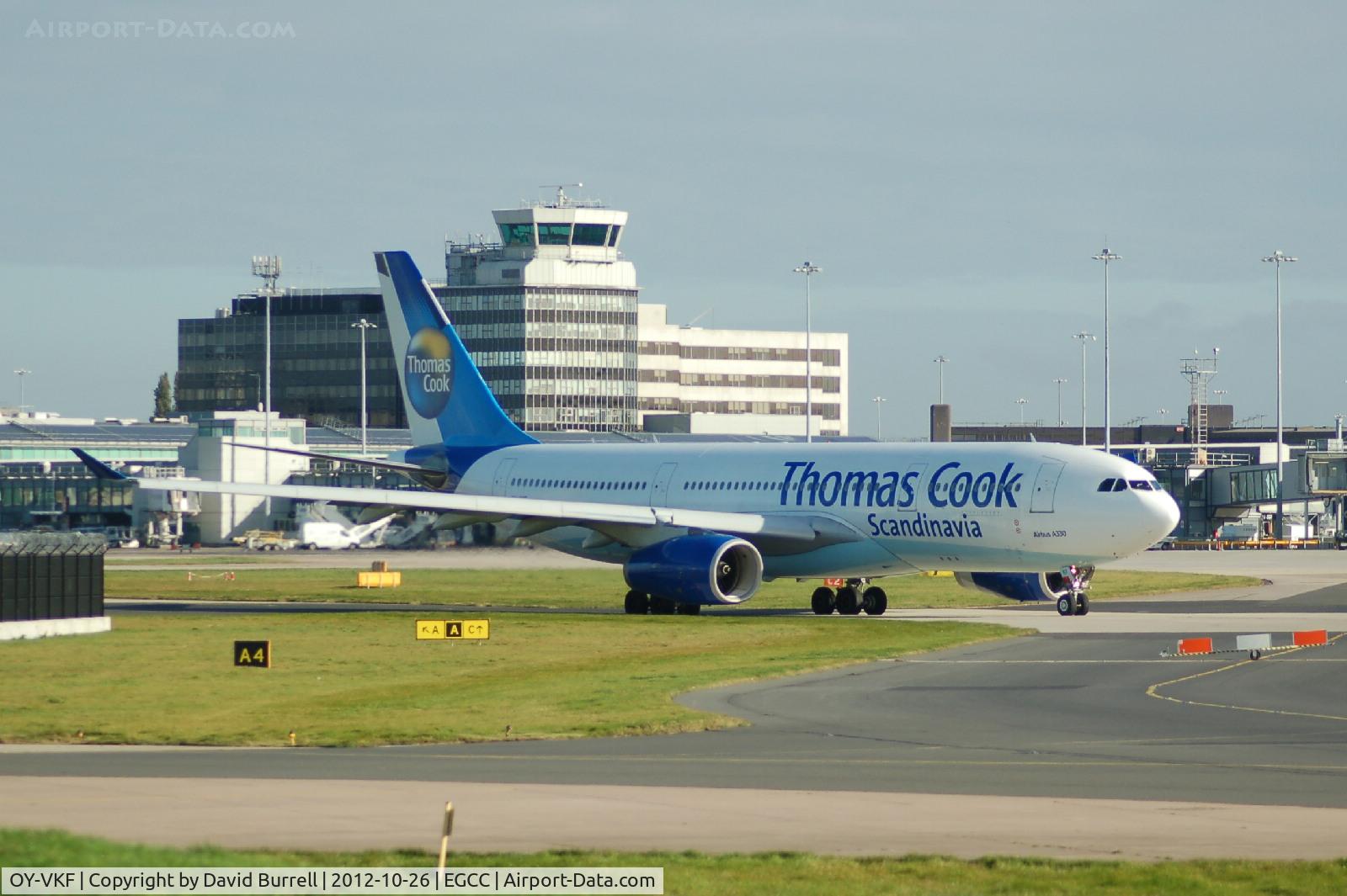 OY-VKF, 1999 Airbus A330-243 C/N 309, Thomas Cook OY-VKF Airbus A330-243 taxiing at Manchester Airport.