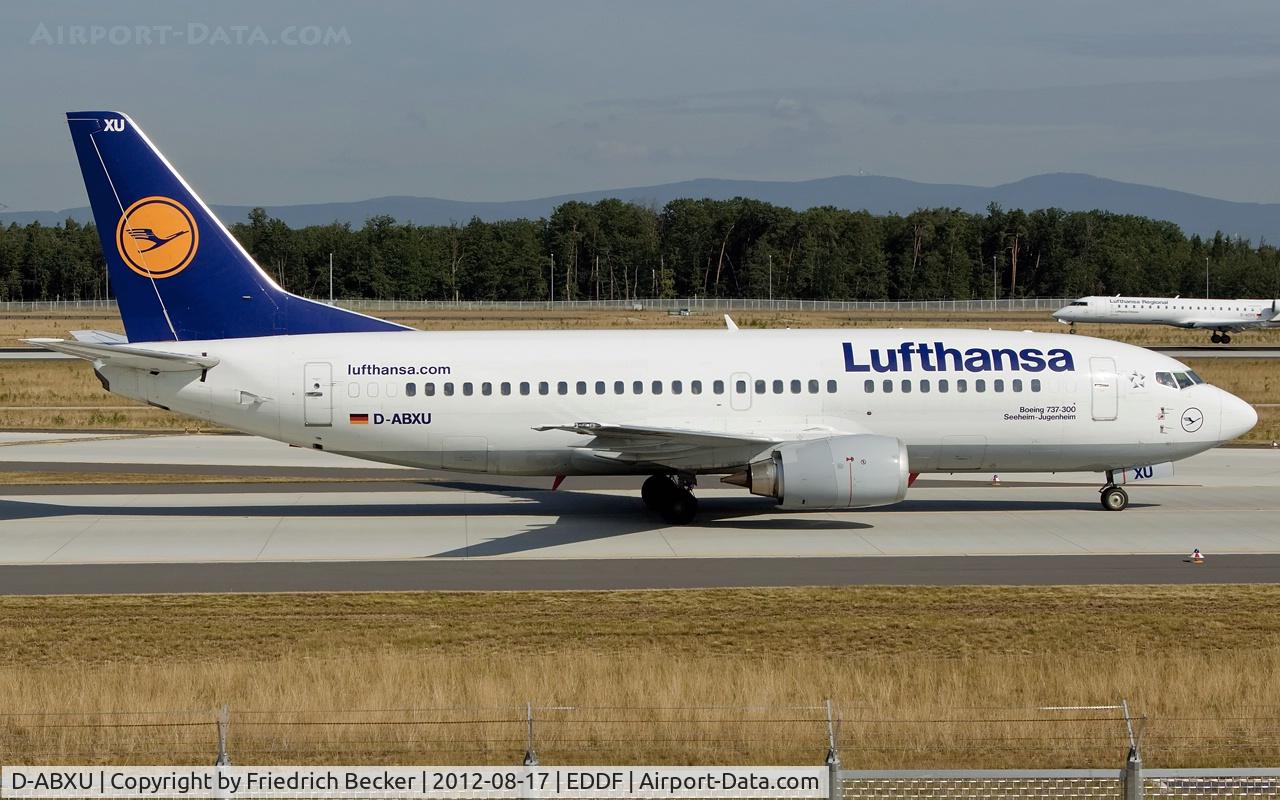 D-ABXU, 1989 Boeing 737-330 C/N 24282, taxying to the gate