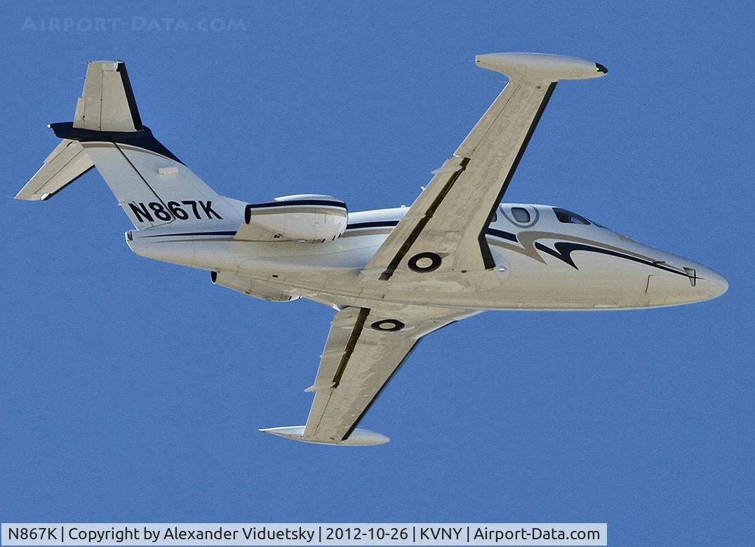 N867K, 2008 Eclipse Aviation Corp EA500 C/N 000239, Taking off from the Van Nuys Airport.