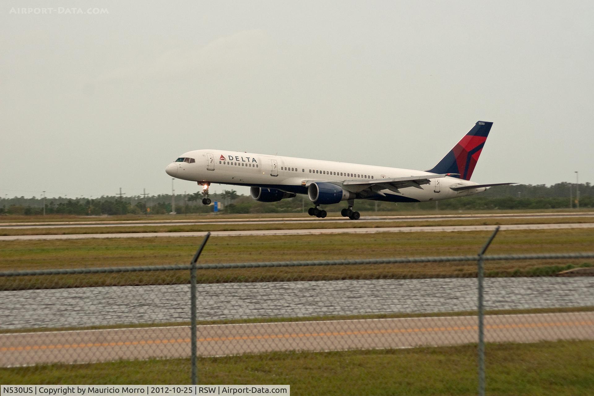 N530US, 1988 Boeing 757-251 C/N 23845, Touching Down RWY 6