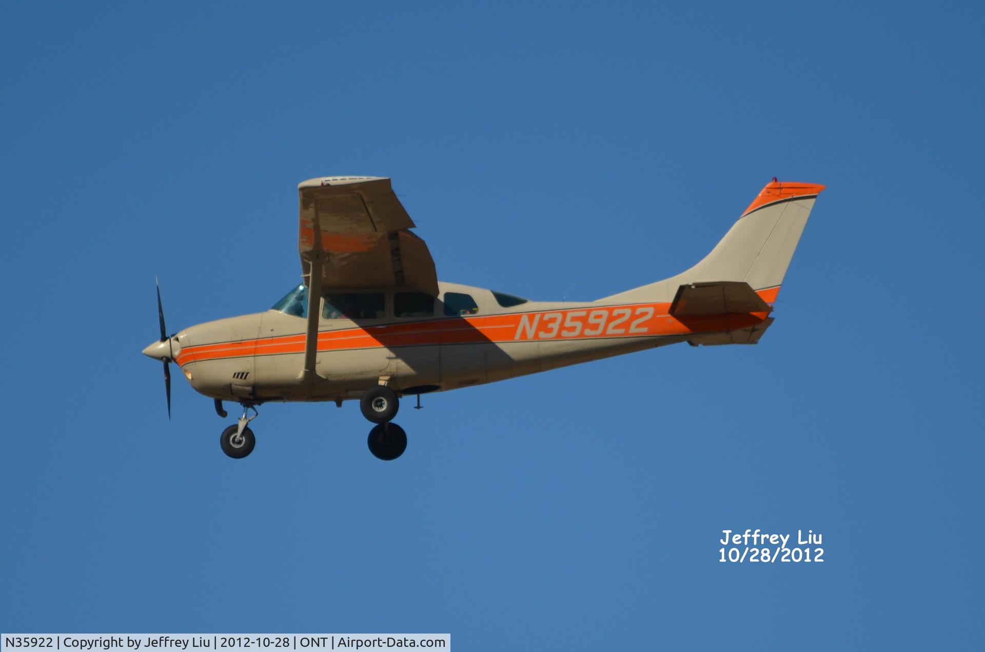 N35922, 1975 Cessna TU206F Turbo Stationair C/N U20602801, About landing at Ontario Airport, CA
