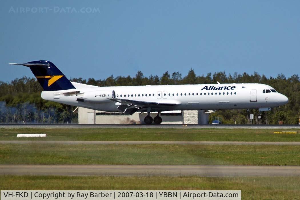 VH-FKD, 1991 Fokker 100 (F-28-0100) C/N 11357, VH-FKD   Fokker F-100 [11357] (Alliance Airlines) Brisbane-International~VH 18/03/2007. Making a fairly heavy landing with the amount of smoke coming from the tyres.
