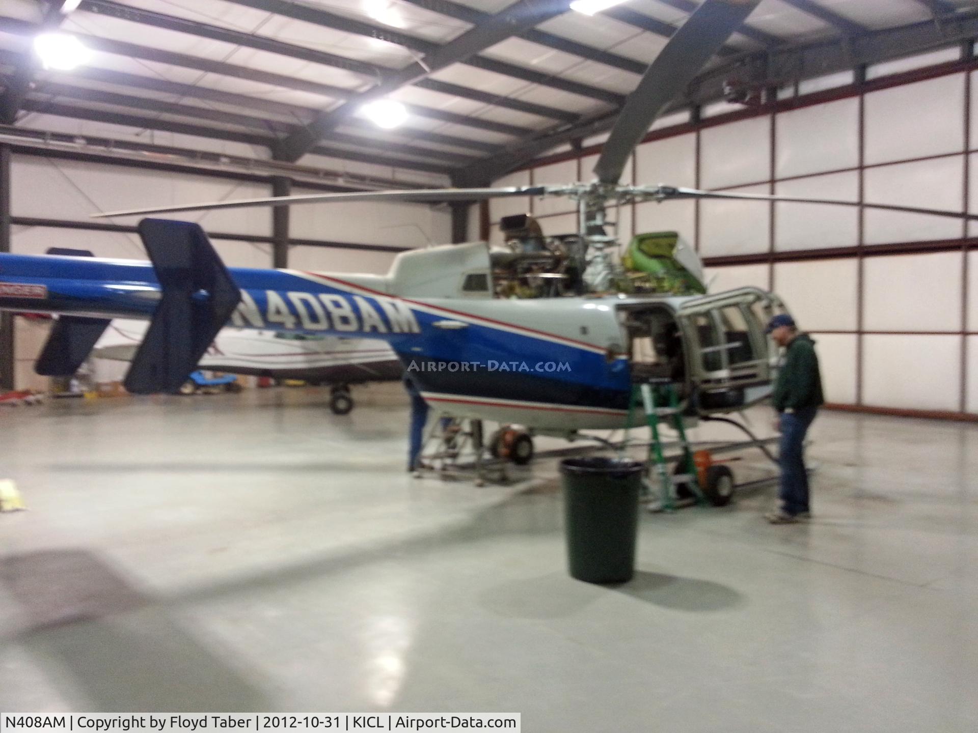 N408AM, 2000 Bell 407 C/N 53445, Maintenance being performed