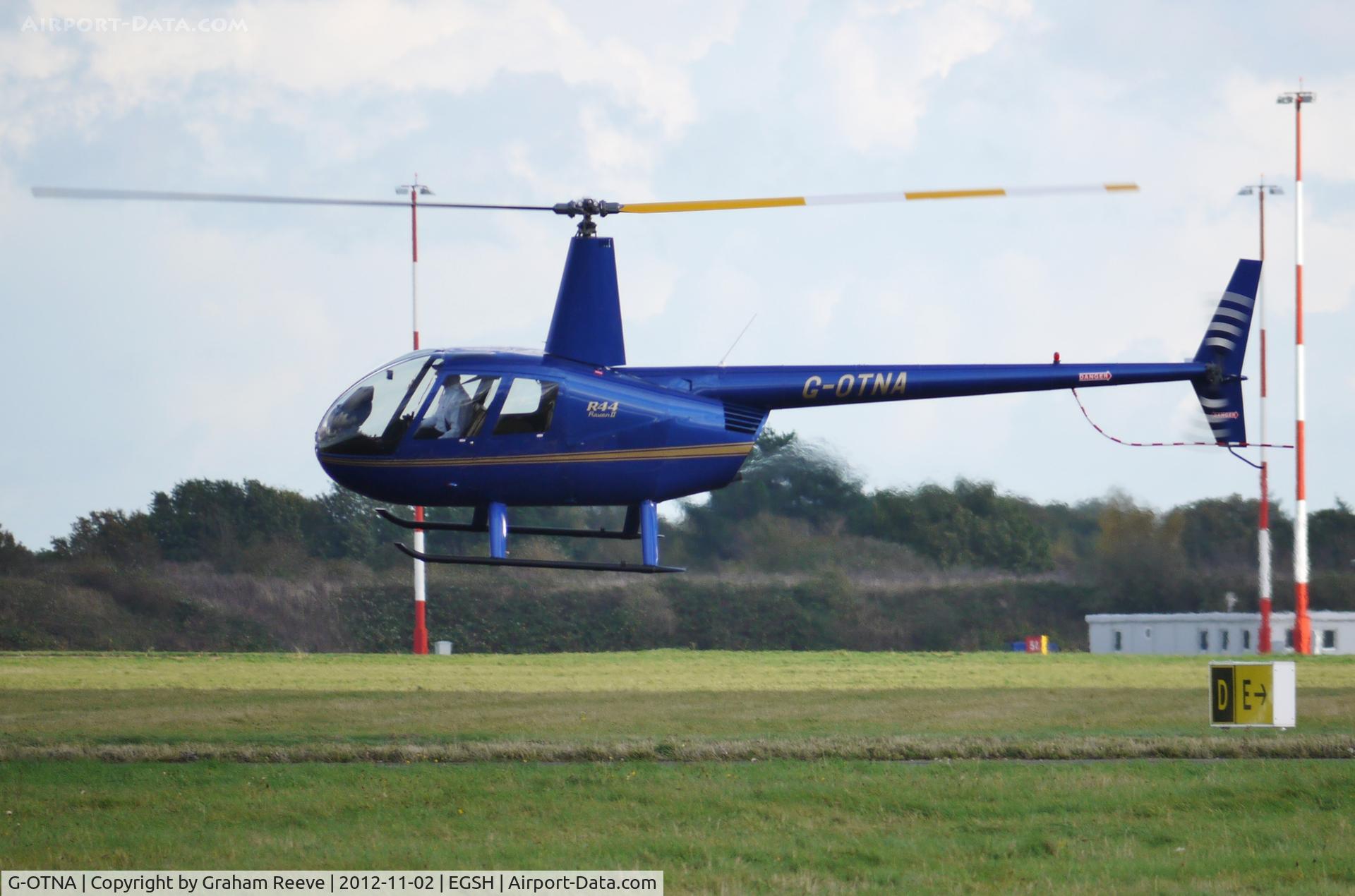G-OTNA, 2006 Robinson R44 Raven II C/N 11092, Departing from Norwich.