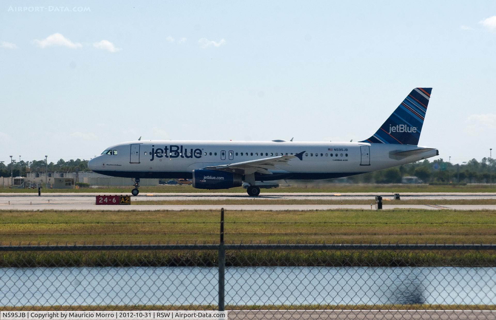 N595JB, 2004 Airbus A320-232 C/N 2286, Taking off RWY 6