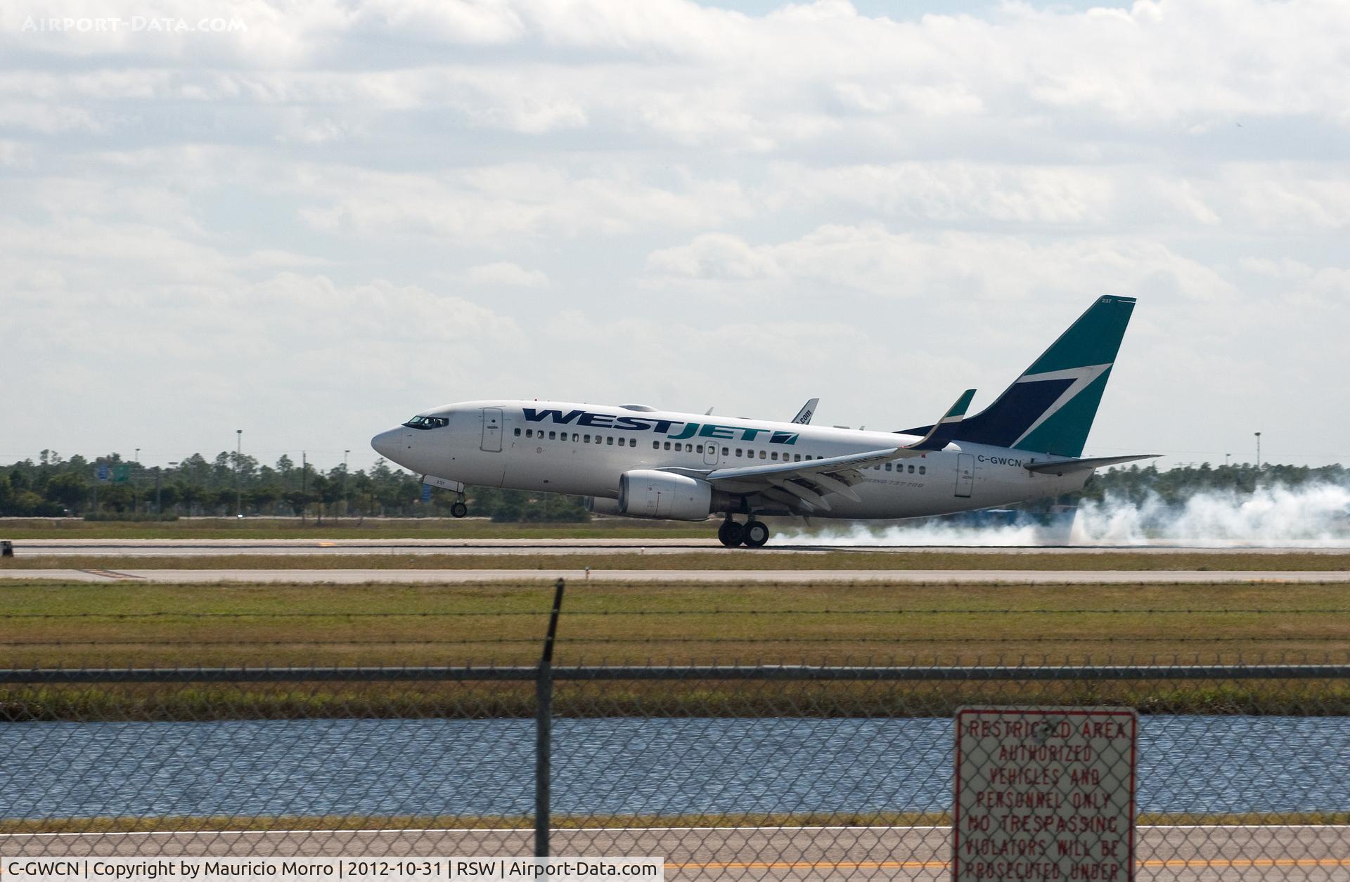 C-GWCN, 2005 Boeing 737-7CT C/N 34157, Touching down from Toronto