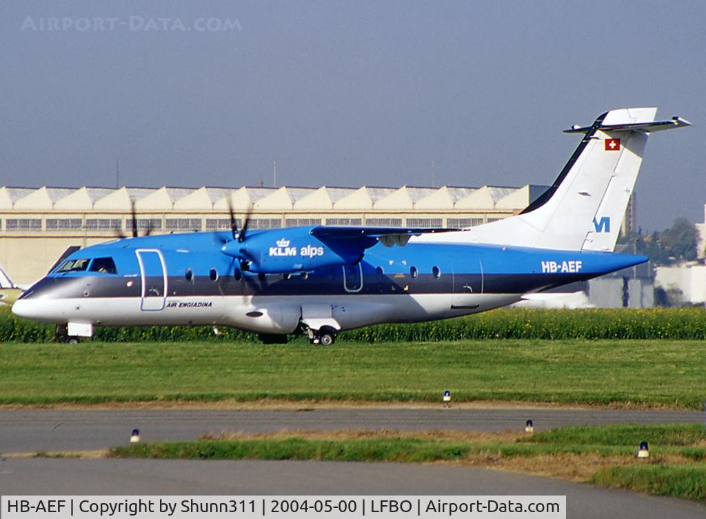HB-AEF, 1994 Dornier 328-110 C/N 3017, Taxiing holding point rwy 32R for departure in basic KLM c/s with small Air Engiadina titles...