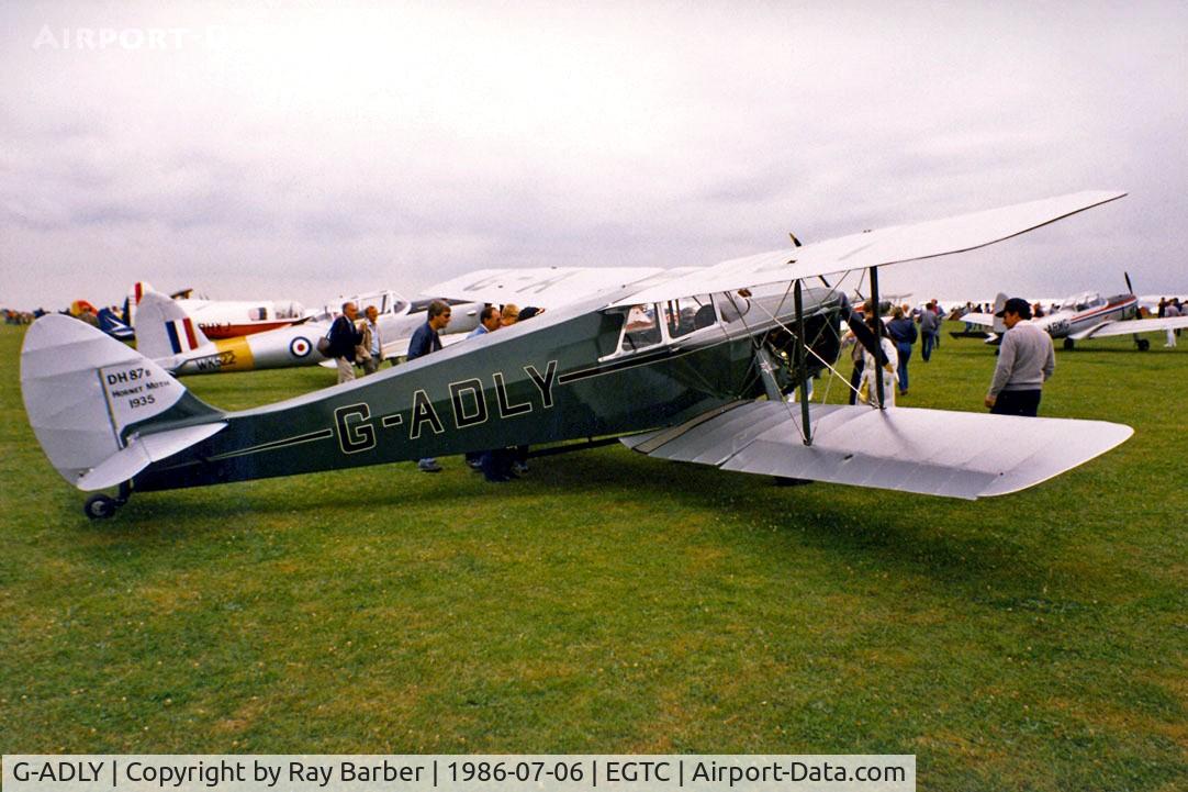 G-ADLY, 1935 De Havilland DH.87B Hornet Moth C/N 8020, De Havilland DH.87B Hornet Moth [8020] Cranfield 06/07/1986. Image taken from a slide.