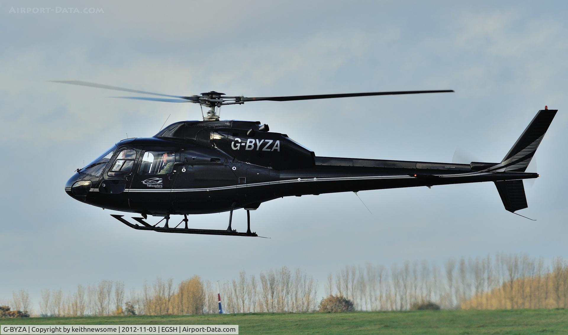 G-BYZA, 1992 Aerospatiale AS-355F-2 Ecureuil 2 C/N 5518, Splash and Dash in the rain !! East Midlands Helicopters.