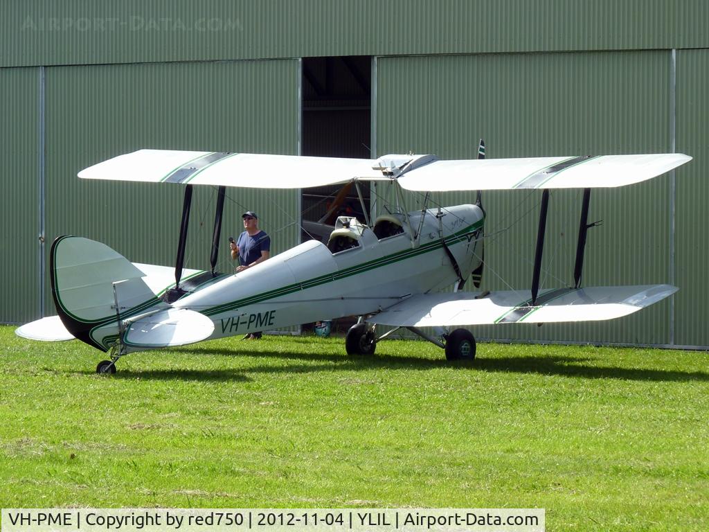 VH-PME, 1970 De Havilland DH-82A Tiger Moth II C/N LV1, VH-PME being hosed down at Lilydale airfield.