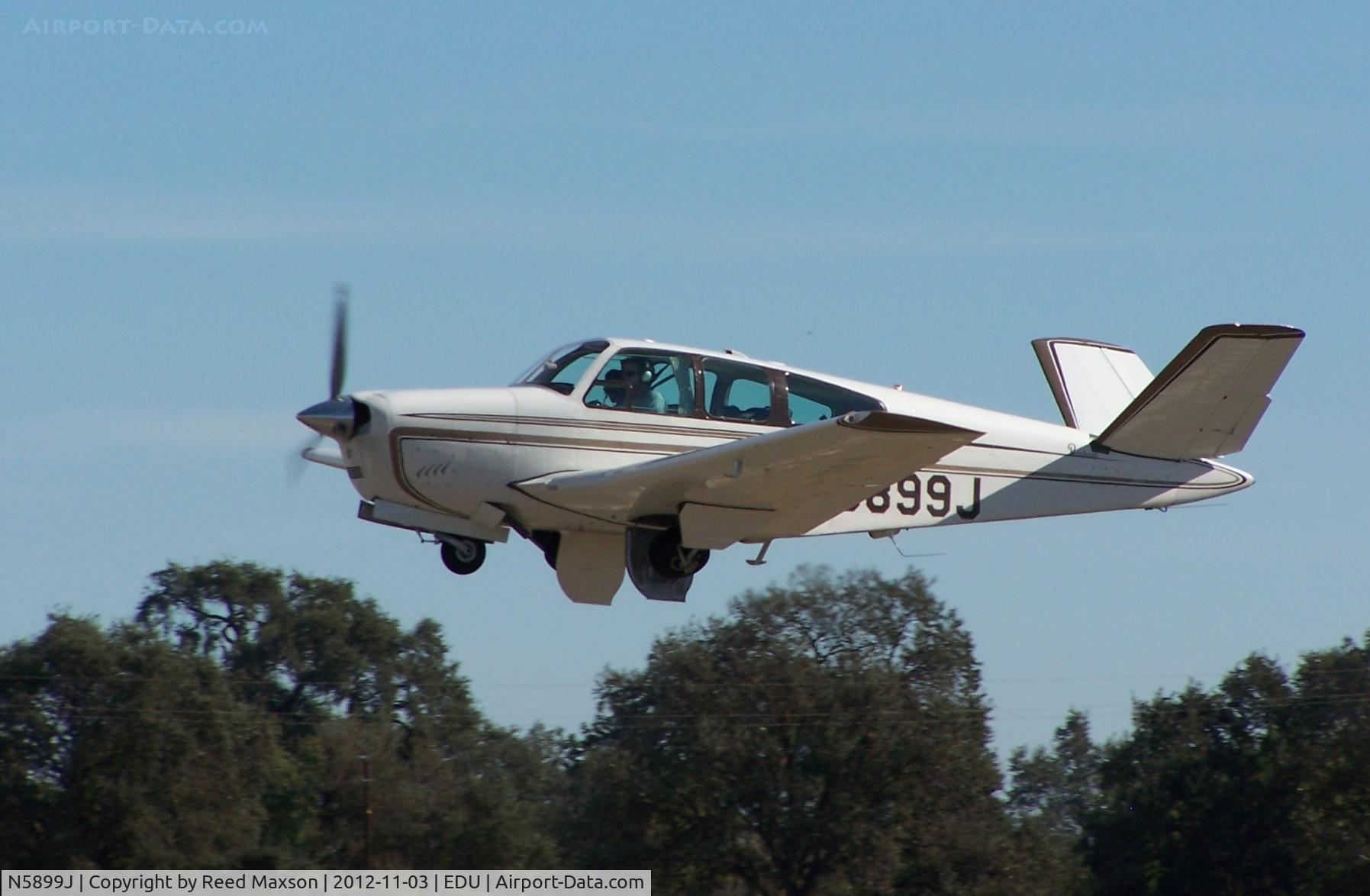N5899J, 1965 Beech S35 Bonanza C/N D-7880, Departing EDU, gear retracting.