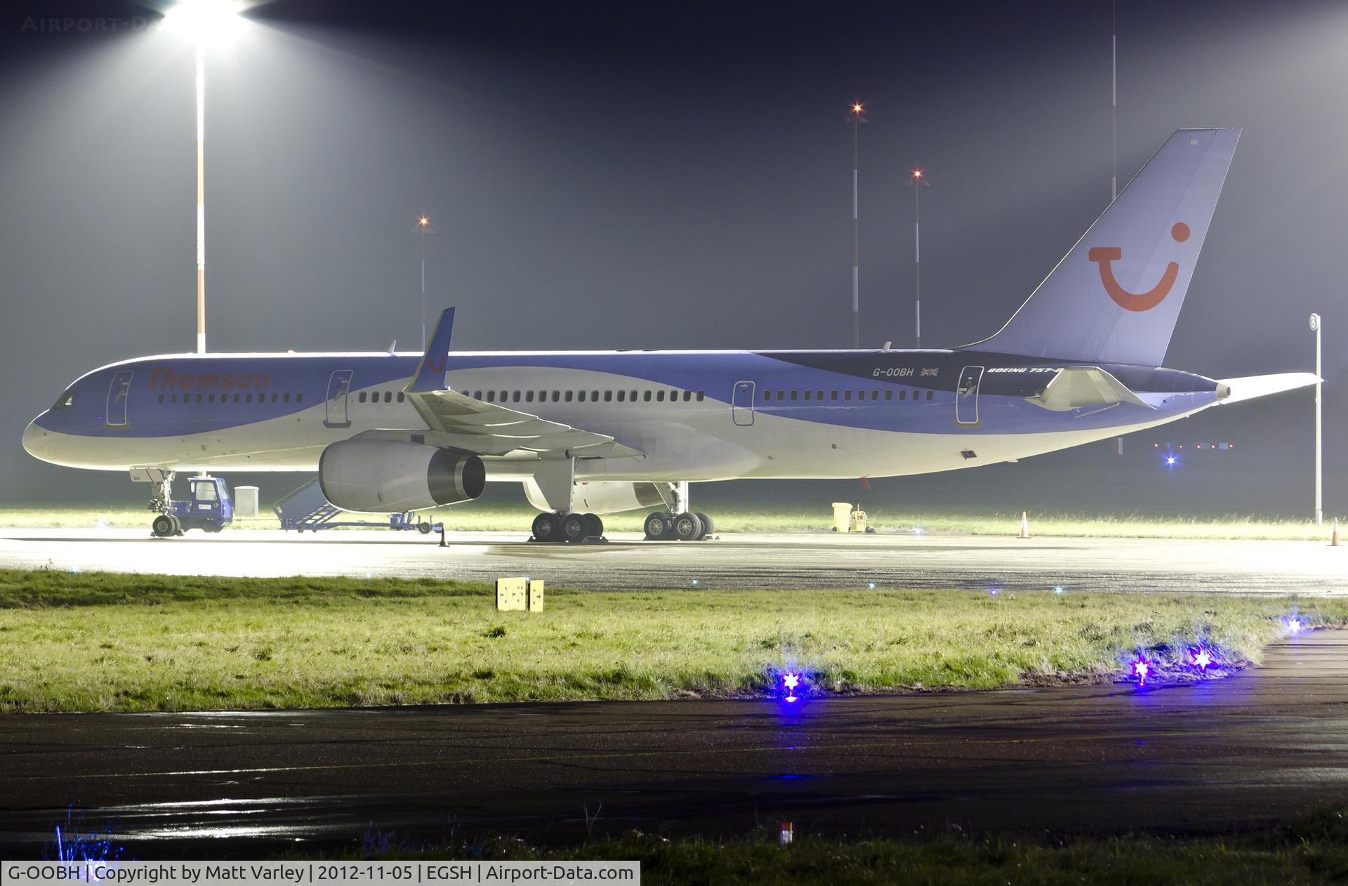 G-OOBH, 1999 Boeing 757-236 C/N 29944, Sat on a misty stand 7 after spray into Thomson's Dreamliner livery.