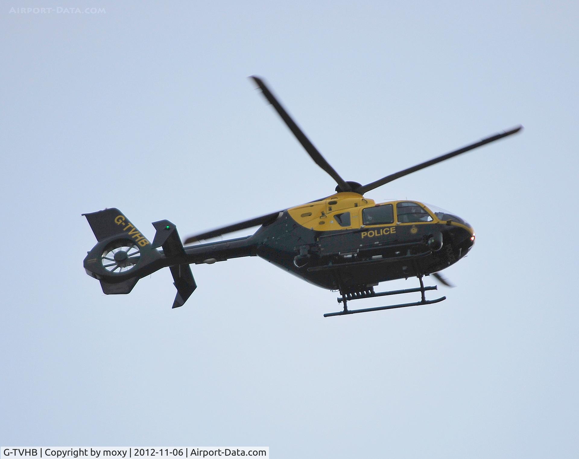G-TVHB, 2010 Eurocopter EC-135P-2+ C/N 0874, Eurocopter EC135 P2+ flying over my house in Old Windsor.