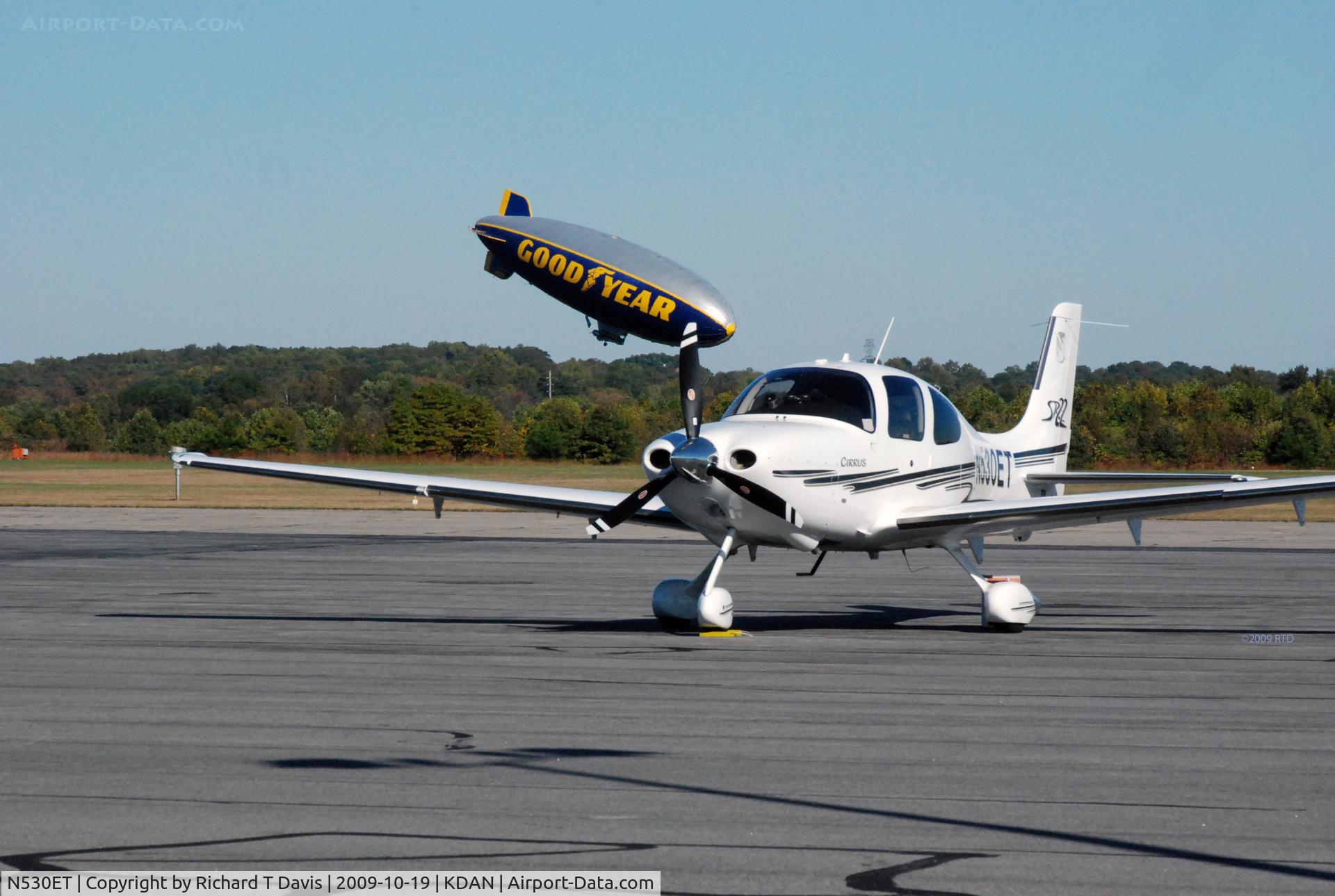 N530ET, Cirrus SR22 C/N 3471, Cirrus SR22 in Danville Va. as the Goodyear steers down toward it's mooring .